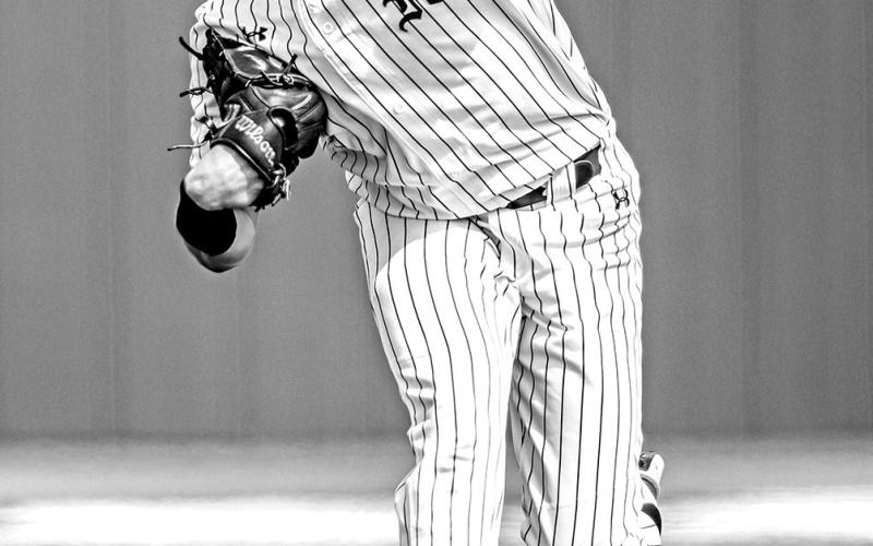 Dax Price hurls a pitch towards home plate during the win against White Oak. Price allowed only 1 run during six innings and stuck out 9.