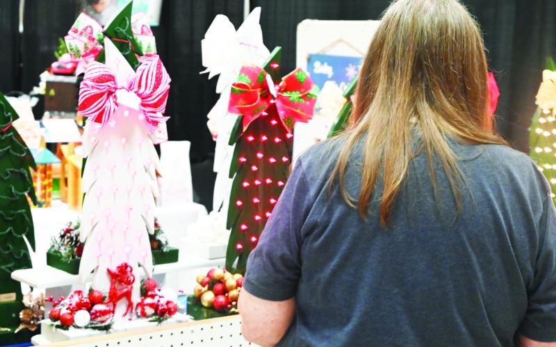 The Mount Pleasant - Titus County Chamber of Commerce hosted their annual Deck the Halls bazaar at the Mount Pleasant Civic Center Friday and Saturday, offering an opportunity for local Christmas shopping. For more photos, see page 11. TRIBUNE PHOTO / MIRANDA OGLESBY