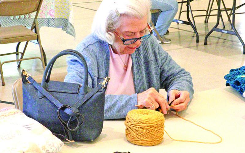 Volunteers work together for National Make a Blanket Day