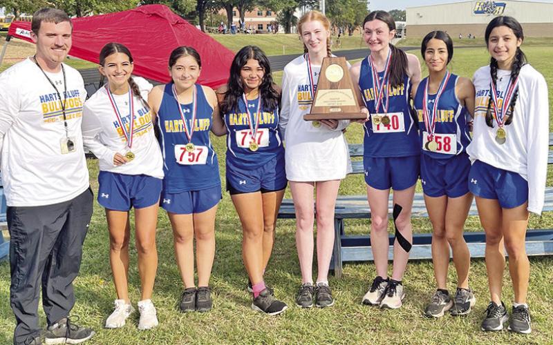 The Harts Bluff varsity boys and girls cross country teams, the Rivercrest boys and Lady Rebel runners Selena Kelley and Brooklynn Whitten will all advance to the regional cross country meet October 24 in Arlington. COURTESY PHOTOS
