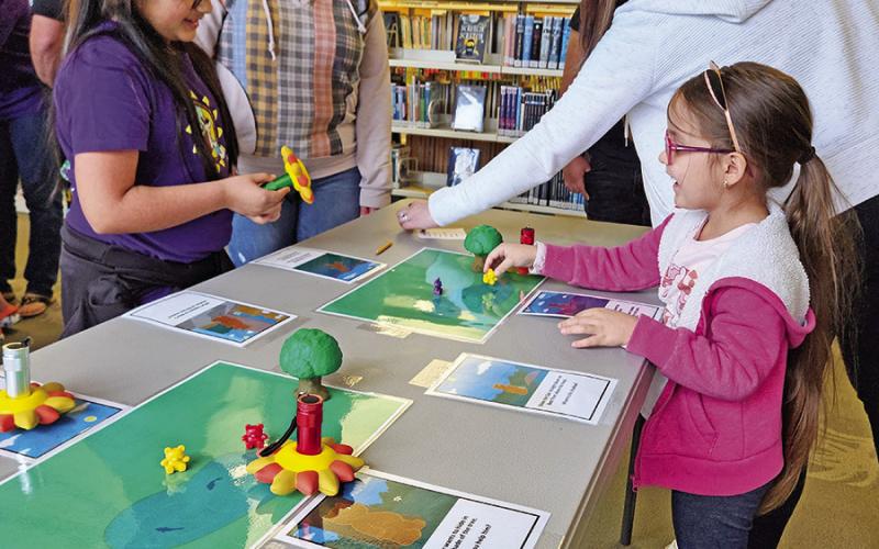 Even rainy weather couldn’t dampen the excitement for the upcoming eclipse. The Mount Pleasant Public Library hosted a Pre-Eclipse Party ahead of the eclipse weekend. TRIBUNE PHOTO / NICOLE KIMBALL