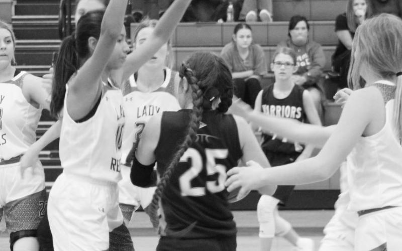 Varsity girls teams open basketball season