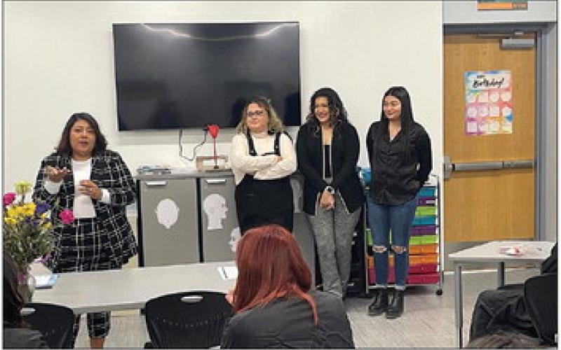 Glossy Nail owner, Eli Ruiz (left), and Nail Techs (right) discuss business ownership with MPHS cosmetology students. COURTESY PHOTO