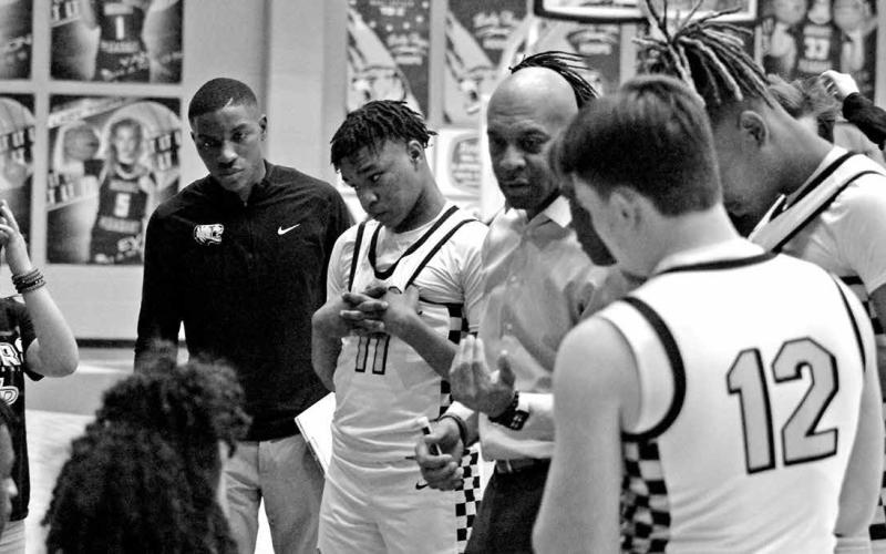 Coach Joey Chism and the Mount Pleasant Tigers finished basketball season with a 28-8 record and will graduate four seniors: Jordyn Hurndon, Chris Williams, Tre Williams and Kai Price. TRIBUNE PHOTO / QUINTEN BOYD