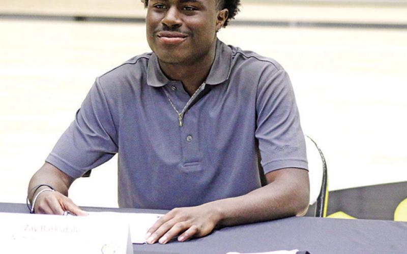 Tiger trio heads to next level on National Signing Day