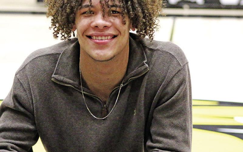 Tiger trio heads to next level on National Signing Day