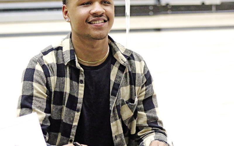 Tiger trio heads to next level on National Signing Day