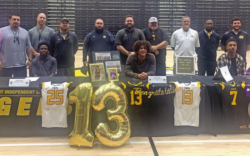 Tiger trio heads to next level on National Signing Day