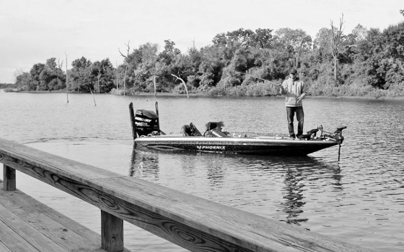Pitching and sidearm roll casting are ideal for placing baits beneath boat docks or tight to targets like stumps, bushes or dock supports. COURTESY PHOTO / MATT WILLIAMS
