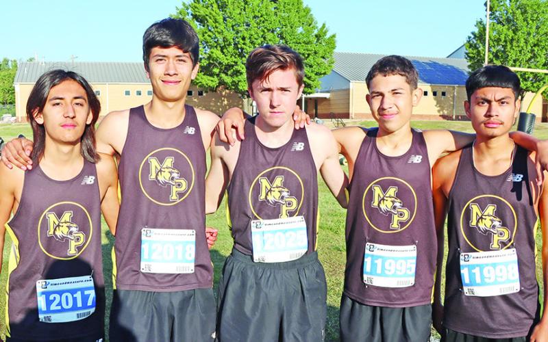 The Tiger Varsity XC team includes L-R Geovanni Calderon, Gilberth Landaverde, Lee Davis, Aidyn Botello, and Alex Rivera. PHOTO BY JOHN WHITTEN