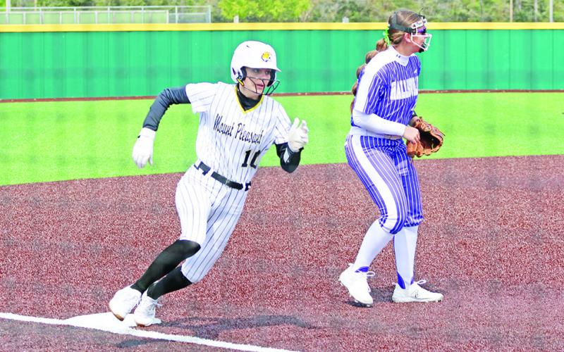 Ella Cross rounds third on her way to scoring a run during Friday’s game against Hallsville. The Lady Tigers fell just short against the Lady Cats, 6-5. TRIBUNE PHOTO / QUINTEN BOYD