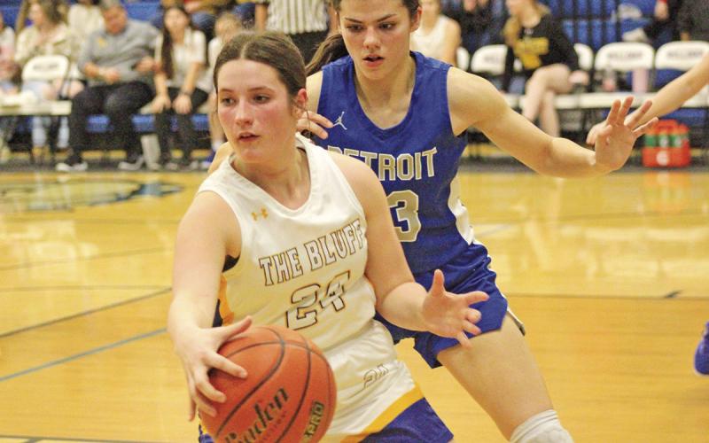 Allie Mayfield collects a loose ball during the Lady Bulldogs’ game against Detroit. Harts Bluff completed the season sweep over the Lady Eagles for the program’s first season sweep over a district opponent. TRIBUNE PHOTOS / QUINTEN BOYD