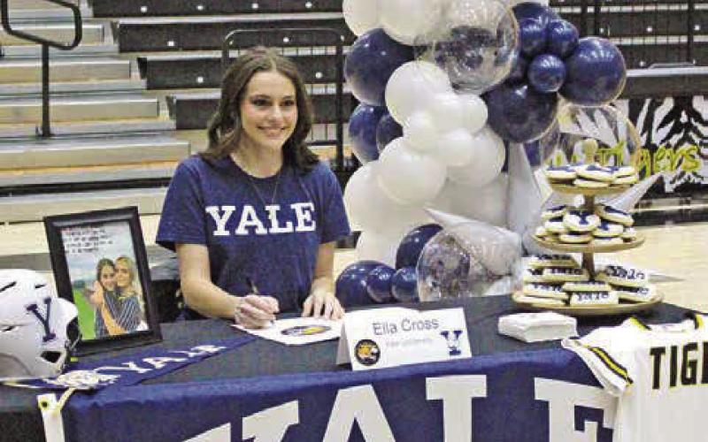 Mount Pleasant softball player Ella Cross signed her letter of intent last week to continue her athletic career at Yale. The Bulldogs play in the Ivy League and finished last season 20-23. COURTESY PHOTO