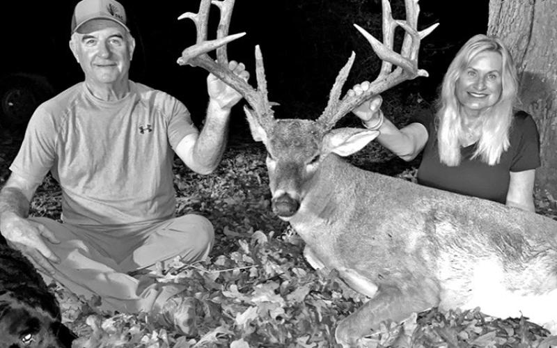 Shanda and Rodney Moore with the impressive Trinity County bruiser the lady hunter brought down on the afternoon of November 4. The 6 1/2-year-old 21 pointer registers official TBGA scores of 185 7/8 gross and 175 6/8 net. It’s among the biggest whitetails ever killed by a lady hunter in the Pineywoods. COURTESY PHOTO / RODNEY MOORE