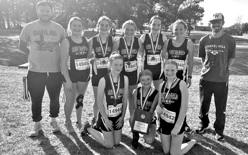 JH girls team with medals and plaque COURTESY PHOTO