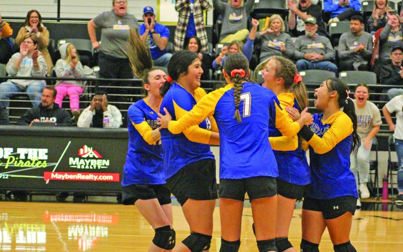 From left, Harts Bluff’s Kaitley Green, Yaretzi Sanchez, Alexis Gonzalez, Kaylee Clay and Kaithlin Le celebrate after a block by Sanchez during the Lady Bulldogs’ bi-district match against Maud in Pittsburg. Harts Bluff won over Maud, 3-0, to advance to the area round before falling to Garrison, 3-0. Harts Bluff finishes the year at 16-17 and loses just one senior -- Kaitley Green -- from this year’s team. TRIBUNE PHOTO / QUINTEN BOYD