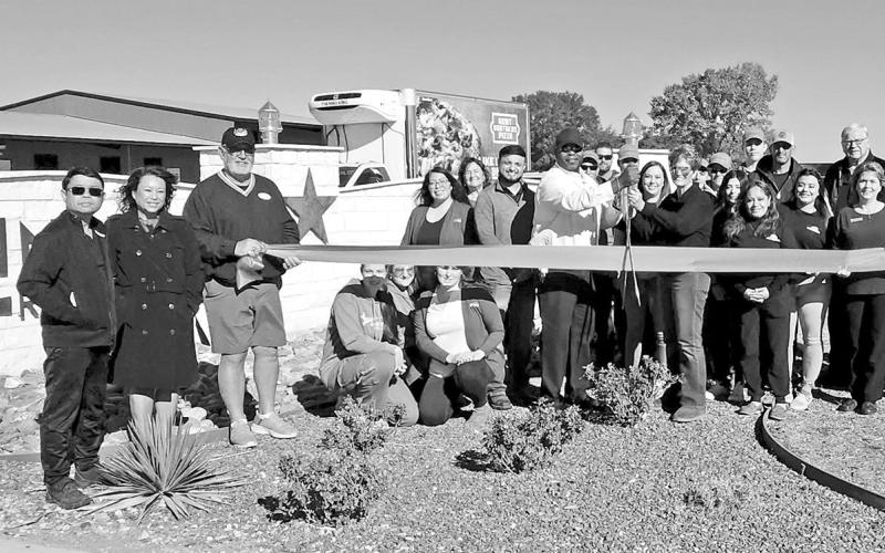 Twin Lakes Resort staff and the Mt. Pleasant Chamber of Commerce celebrate the resort’s opening with a ribbon cutting BEE PHOTO / NICOLE KIMBALL