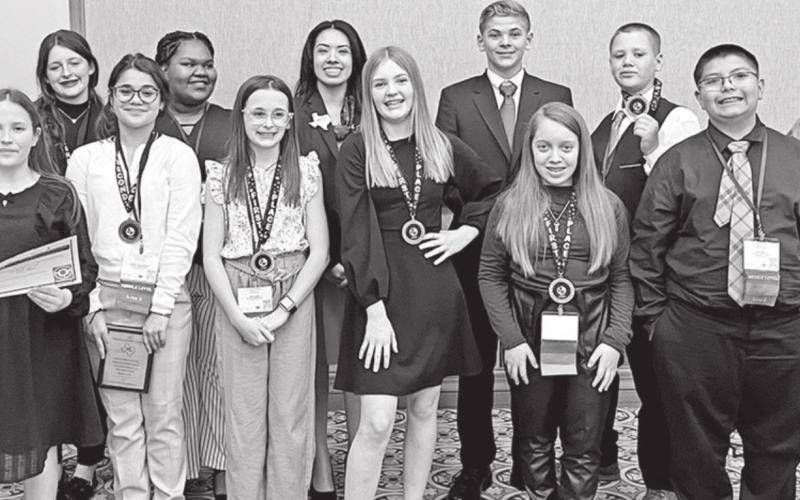 MPISD FBLA Middle Level National Qualifiers and Alternates: Front L to R: Jaliyah Brown, Emily Crabb, Sabrina Otero-Svirska, Sage Jordan, Jayden Baker, Aloani Laboy, Juan Mata, Isabella Furnish. Back L to R: Alba Zeqaj, Mykaela King, FBLA representative, Cooper Rider, Ryan Burg