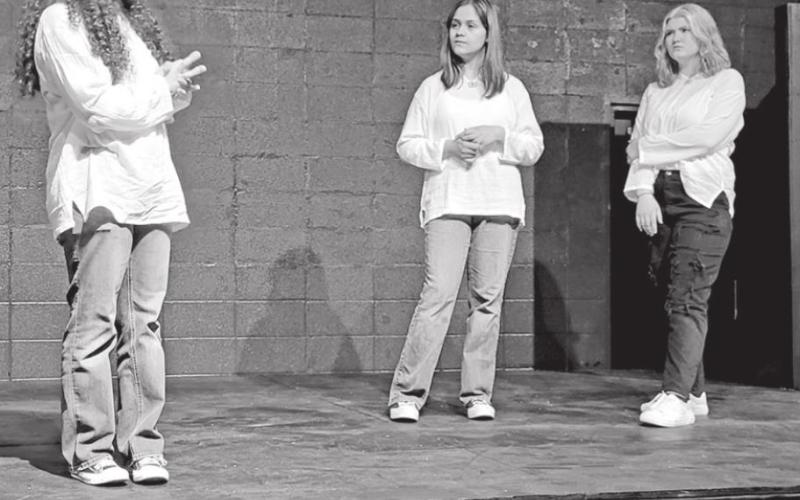 Ashanti Presley explains her love of Shakespeare to Nayeli Rivera and Faith Rothrock in The Rough Theatre Company production of The Complete Works of Shakespeare Abridged (Revised). COURTESY PHOTO