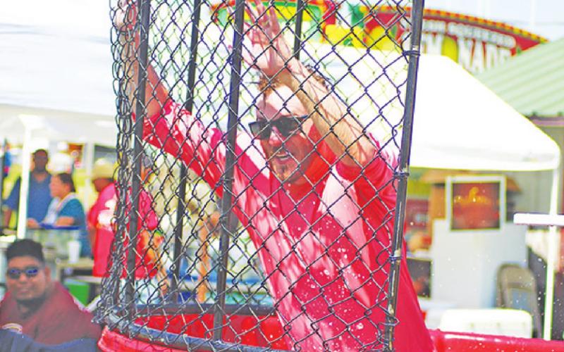 The dunking booth was just one of the many visitor favorites at last Saturday’s Happy Birthday USA in Mount Pleasant. See more photos from the event on Page 8. TRIBUNE PHOTO / QUINTEN BOYD