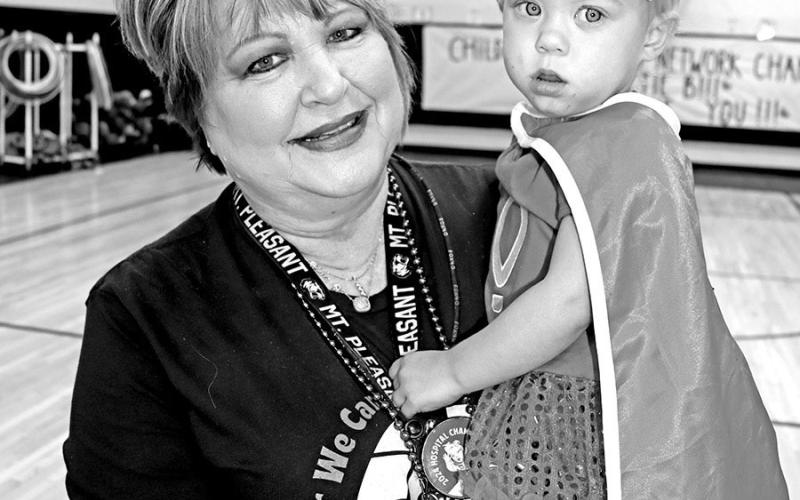 Corprew P.E. teacher, Karen Crooks, holds CMN Champion and granddaughter, Scottie B. COURTESY PHOTOS