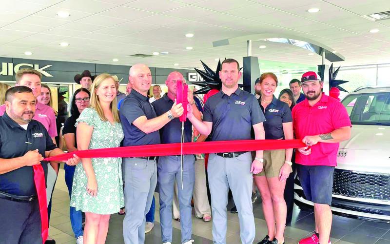 On Friday, Sept. 6, the red ribbon was snipped and Toliver Buick GMC officially opened its doors. Their new location is at 2739 W. Ferguson Road in Mount Pleasant. COURTESY PHOTO / MOUNT PLEASANT CHAMBER OF COMMERCE