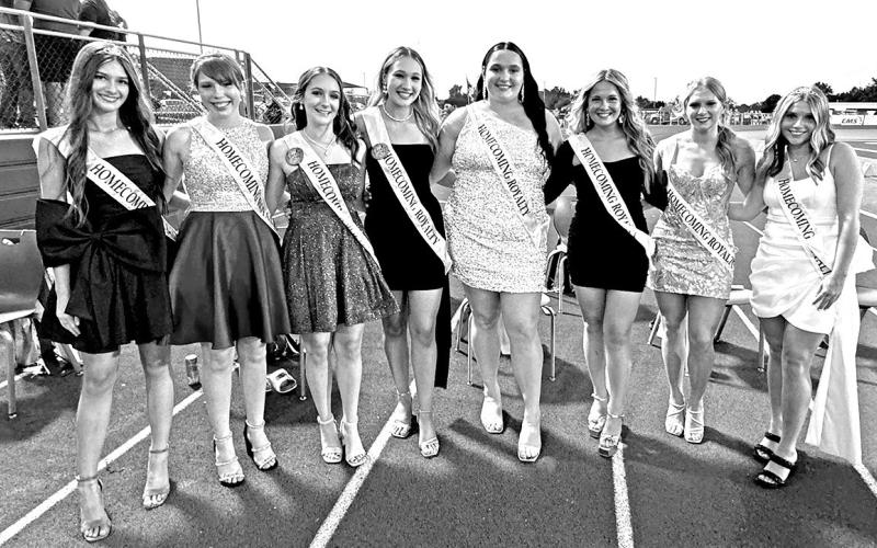 LtoR: Emmersyn Reed, Kylie Rodgers, Marissa Bankhead, Avery Burns, Trinity, Baron, Alyssa Morgan, Olivia Baird, and Kori Doan. Photo by Carley Hunt (prior to crowning in halftime ceremonies)