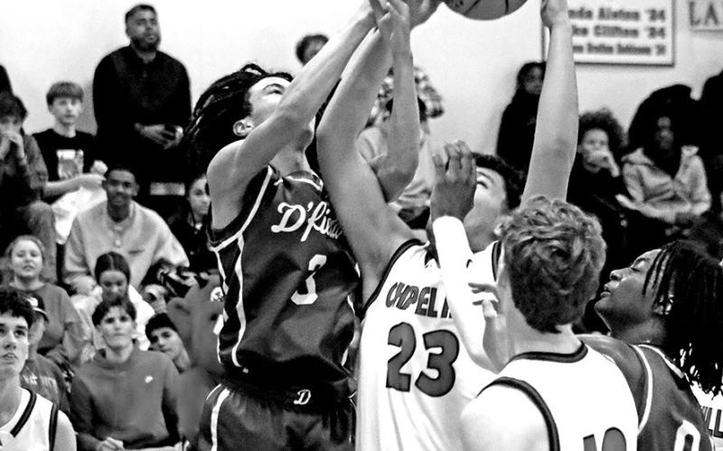 Banda With The Board Chapel Hill’s Angel Banda (23) goes up to grab a rebound in the loss against Daingerfield last week as teammate Bryce Grissom (12) looks on.