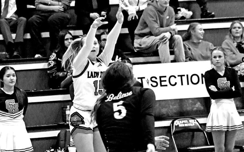 Big Shot Buchanan Chapel Hill’s Brooklyn Buchanan (15) puts up a three-point shot during last week’s 34-19 home win over Daingerfield. The Lady Devils improved to 4-3 in District 13-3A play last week with big wins over the Lady Tigers and Hughes Springs.
