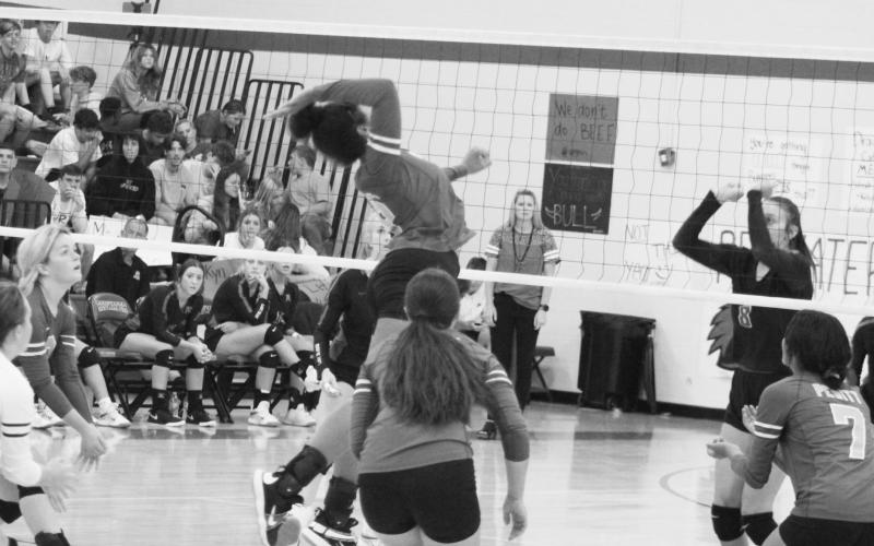 Amyia Hill jumps to spike a ball during Pewitt’s district match-up against Redwater Tuesday. The Lady Brahmas fell to the Lady Dragons, 3-0 (24-26, 22-25, 13-25). TRIBUNE PHOTO / QUINTEN BOYD