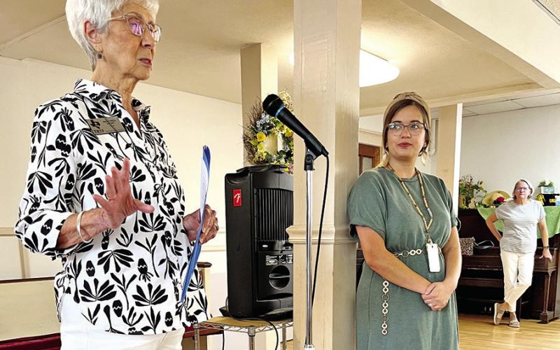 Mary Nell Short, Trustee for the Texas Retired Teachers Foundation presents Ashlynn Gamblin with a $1,000 First Year Teachers Scholarship