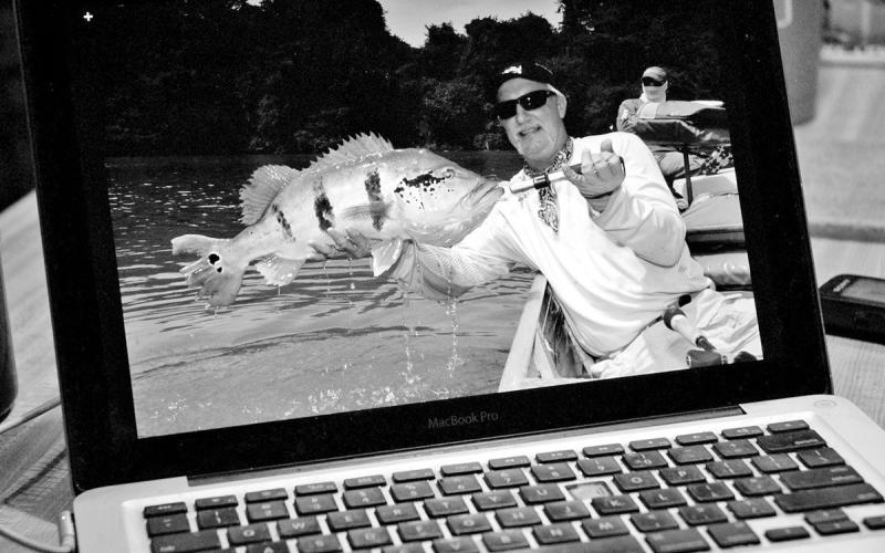 The author’s old MacBook Pro laptop has survived multiple trips to the wilds of the Amazon Rainforest and to some of Mexico’s finest bass lakes. With a swollen battery, busted keyboard and obsolete operating system, the PC is limping on its last leg and way past due for a replacement. (Photo by Matt Williams)