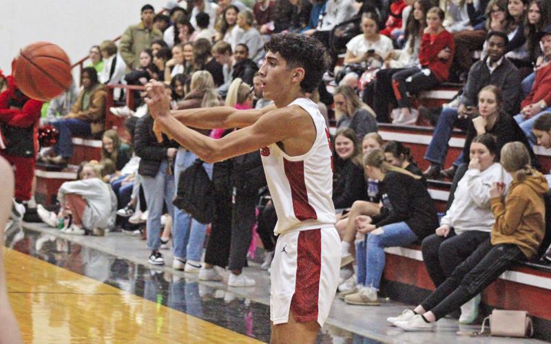 Cayden Martinez makes a pass during the Red Devils’ Homecoming game last Friday. Chapel Hill is 26-1 on the season going into Friday’s game against Winona, and is ranked fifth in Class 3A by the TABC Hoops poll. TRIBUNE PHOTOS / QUINTEN BOYD