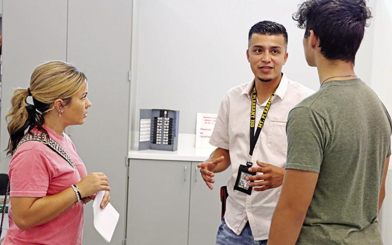 MPHS Electrical Technology teacher, Alan Salinas, tells a student and parent what they will be learning this year.