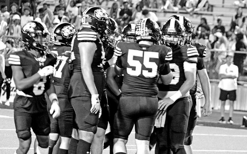 The Tigers’ offensive line gets into position for a play during Friday’s game. The Tigers play the Whitehouse Wildcats Friday. COURTESY PHOTOS