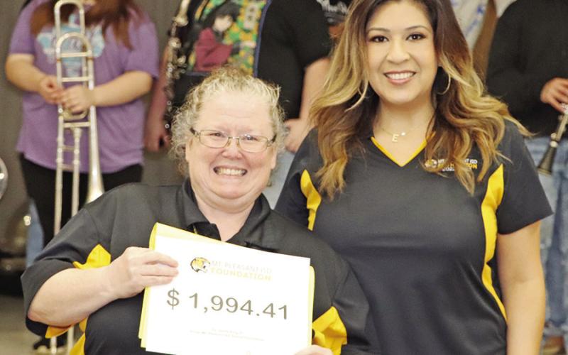 MPISD GT teacher receives a grant for robotics materials from Foundation member Esther Smith. COURTESY PHOTO