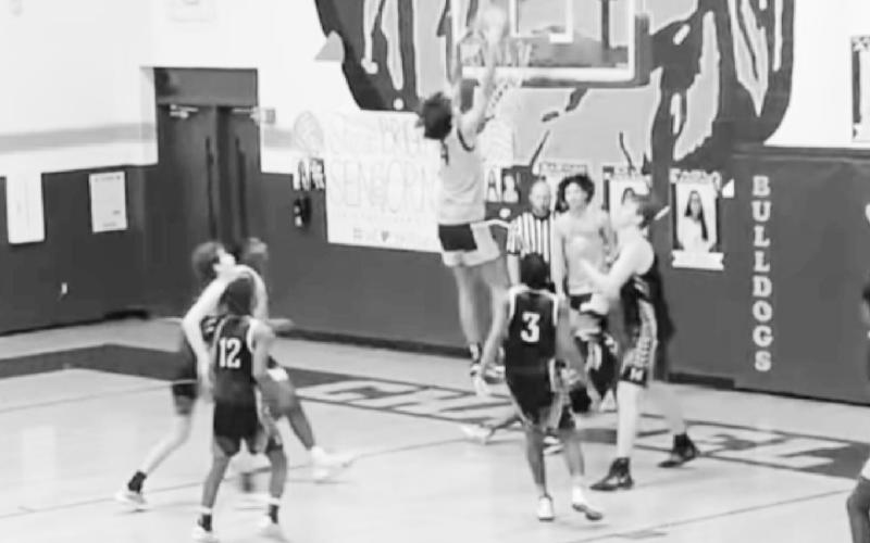 Kai Price gets his first dunk in Saturday’s scrimmage vs Nacogdoches. COURTESY PHOTO / KISHA PRICE