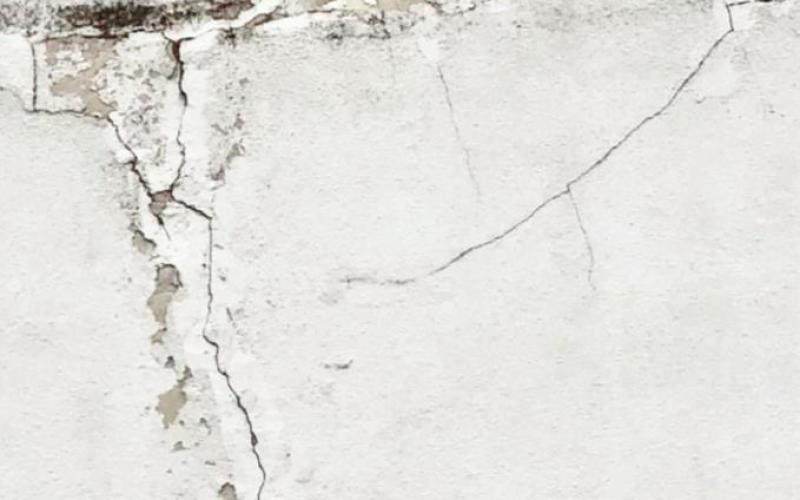The poor condition of the exterior wall before construction began on the stucco is shown here. COURTESY PHOTO