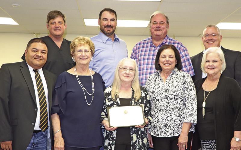 Miller was recognized for 50 years of service at the March meeting of the MPISD Board of Trustees. 1st row (L to R) Juan Duenez, Yvonne Hampton, Gay Miller, Kim Crabb, Sandy Bible. 2nd row (L to R) Dr. Kenny Thompson, Luke Anderson, Buddy Blue, MPISD Superintendent Judd Marshall. COURTESY PHOTO