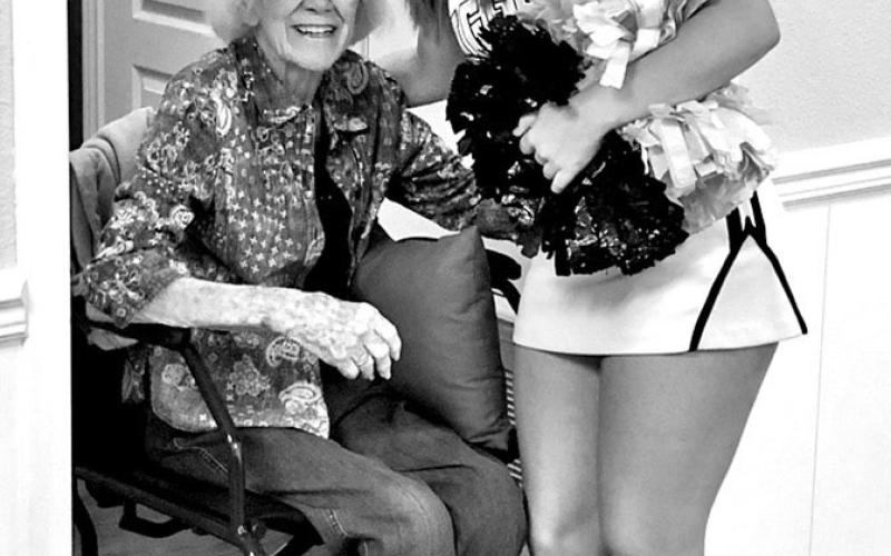 Resident Barbara Marshall was happy to see great-granddaughter and MPHS Cheerleader Tenley Marshall.