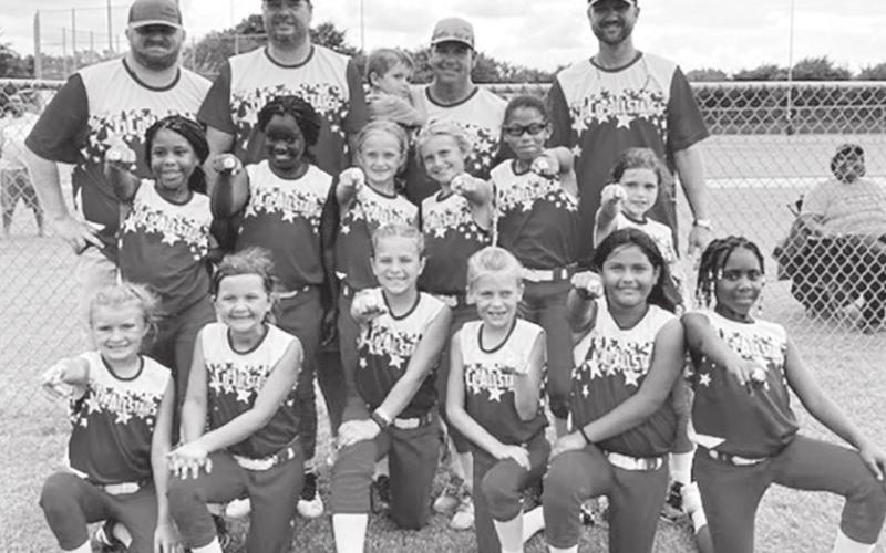 Titus County Allstars 8U – Top Row: Fred Porterfield, Brad Lowry, Whit Scoggins, Will Scoggins, Jason Bell. Middle Row: Mallory McCoo, Darlecia Williams, Karli Lowry, Claire Scoggins, Skye Thomas, Tess Scoggins. Bottom Row: Bryleigh Porterfield, Chaney Bell, Kenley Cochran, Jentrie Wilbanks, Jaylee Avilez, Jariyah Brown. COURTESY PHOTO