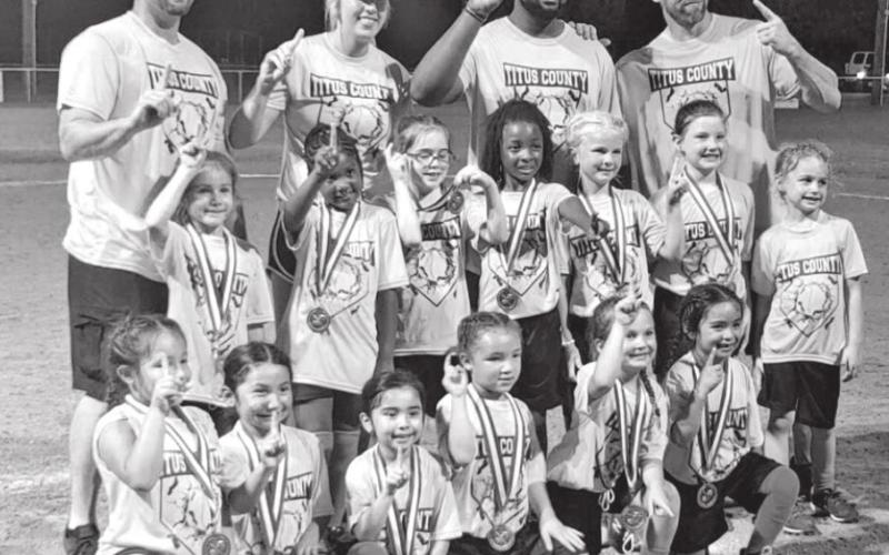 Titus County Allstars 6U – Top row: Justin Posey, Jennifer Posey, Marquin Brewer, Kerry Posey. Middle row: Blaykon Crocker, Chyna Williams, Livvie Posey, Mckensie Brewer, Jaylee Posey, Cali Derrick, Colbie Posey (bat girl). Front row: Aubree Organista, Valentina Vega, Andrea Zuniga, Emily Hillburn, Kenadie Ragsdale, Josie Rodriguez. COURTESY PHOTO