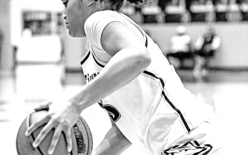Kaylin Brannon drives to the basket and scores just before half against the Lady Cats.