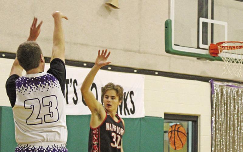 CHAAMP’s Adam Roseberry launches a three over a Paris Homeschool defender. COURTESY PHOTOS