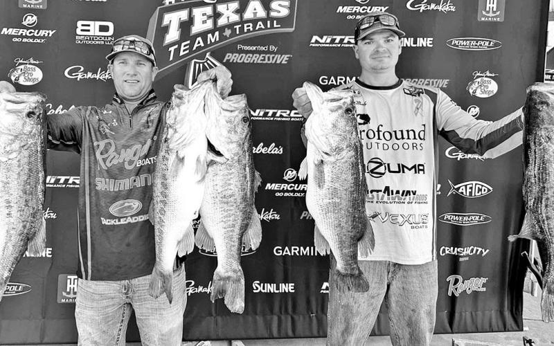 Jason Bonds (left) and Derek Mundy won the Texas Team Trail event recently a whopper sack weighing 37 pounds, 13 ounces. (TXTT Photo)