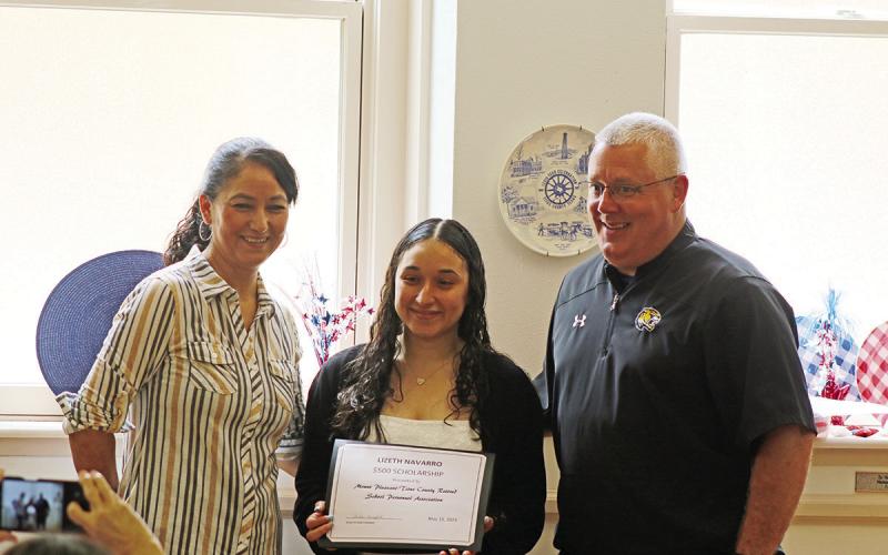 Mount Pleasant senior Lizeth Navarro was one of two recipients of the Mount Pleasant-Titus County Retired School Personnel Association’s annual scholarships. She is pictured with mother Lidia and Mount Pleasant superintendent Judd Marshall. TRIBUNE PHOTOS / QUINTEN BOYD