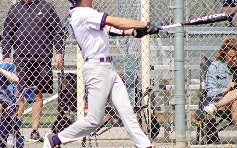 CHAAMP’s Ryan Meadows swings at a fastball against Dallas HSAA