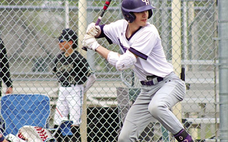 Drew Wigley loads up to swing at a Dallas HSAA fastball. COURTESY PHOTOS