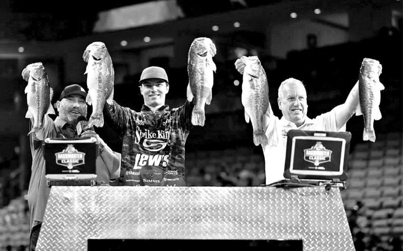 Easton Fothergill (center) set a new Bassmaster Classic weight record at Texas’ Lake Ray Roberts with a three-day total of 7611 on 15 bass. Fothergill’s weight was anchored by his 29-6 limit in the second round. (Bassmaster Photo)