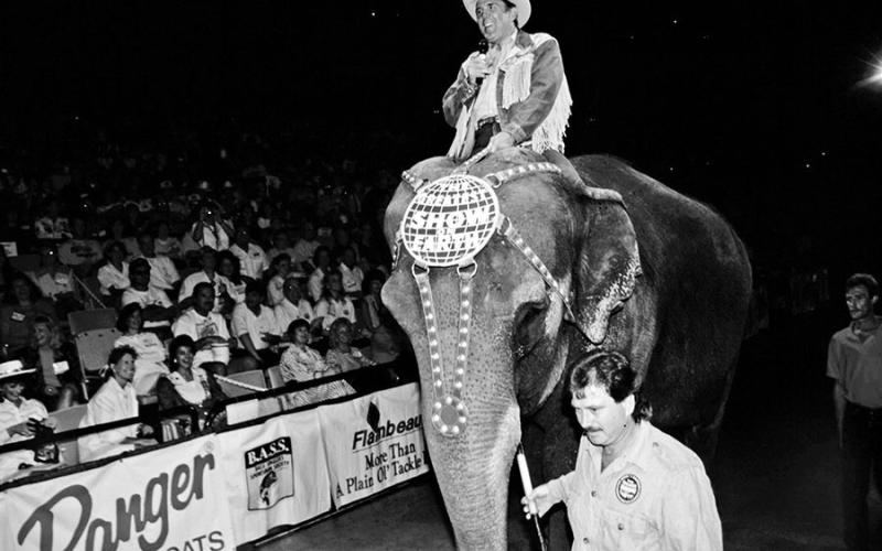 BASS founder Ray Scott passed away in May. Well known for his ability to cast electricity on a crowd, Scott rode a Ringling Brothers Circus elephant into the weigh-in arena during the 1993 ‘Classic on Logan Martin Lake in Alabama. COURTESY PHOTO / BASS